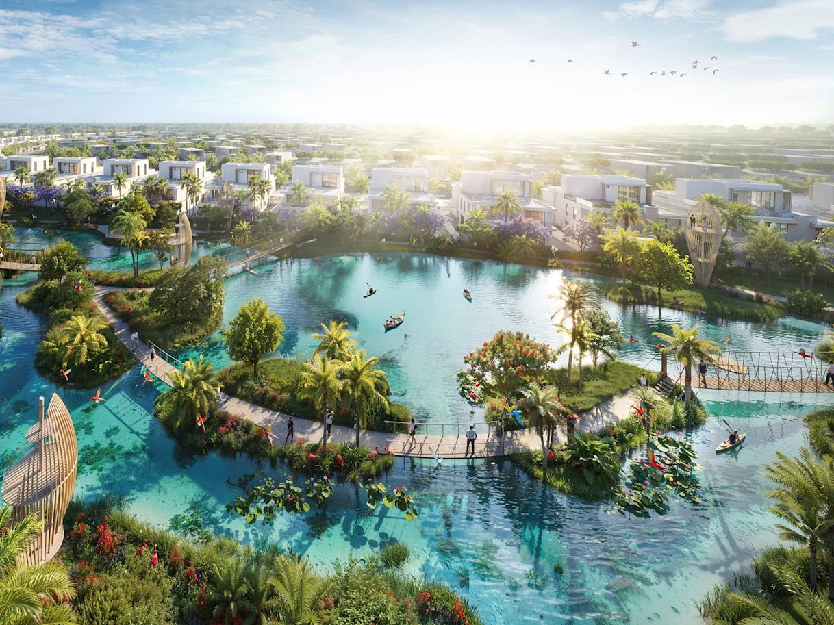 Lake with footbridges, kayaks and landscaped islands at DAMAC Islands 2