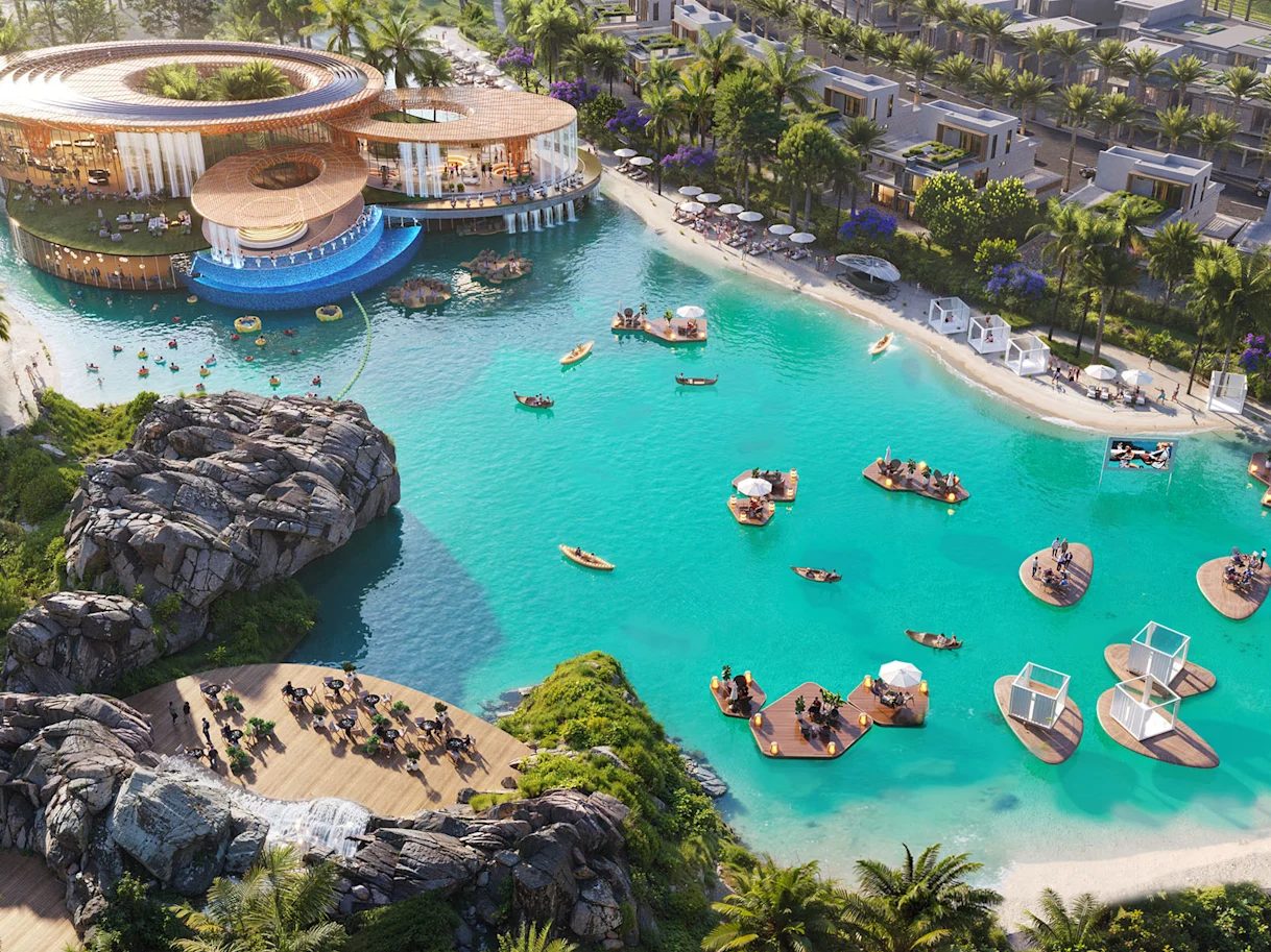 Lagoon with rock features, floating decks and a waterfront pavilion at DAMAC Islands 2