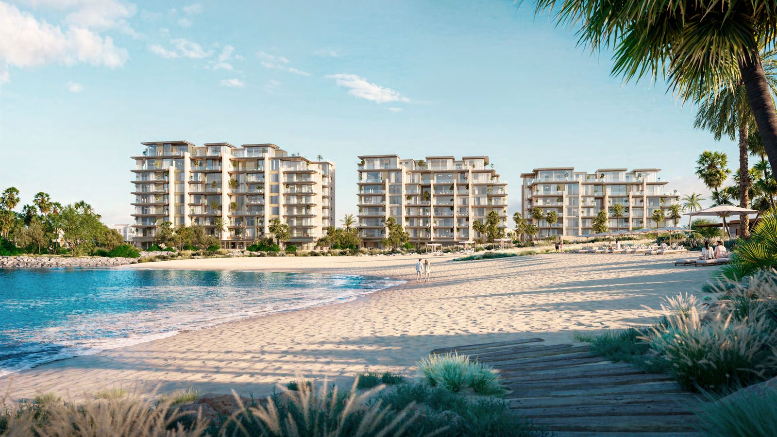 Solaya's beachfront buildings above the shoreline at sunset