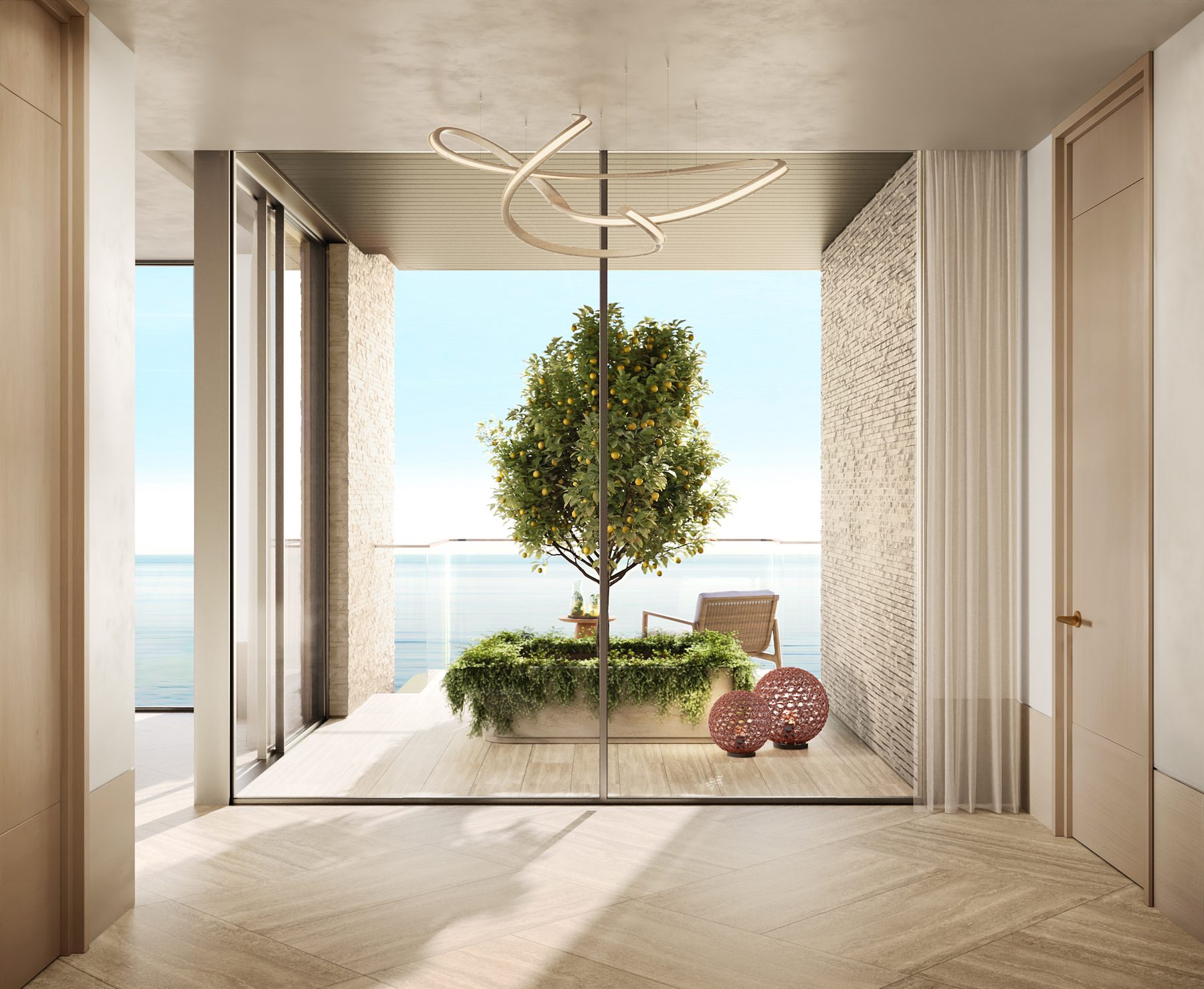 Duplex entrance lobby with a tree and sea views