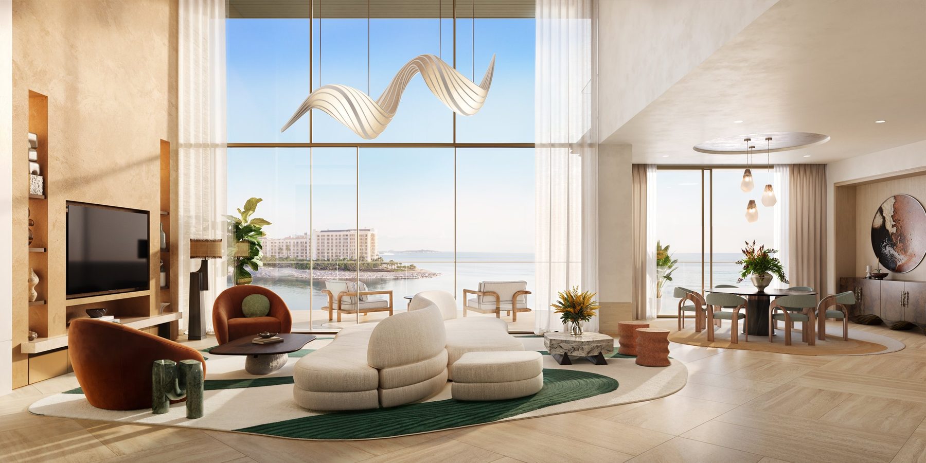 Double-height duplex living room facing the water
