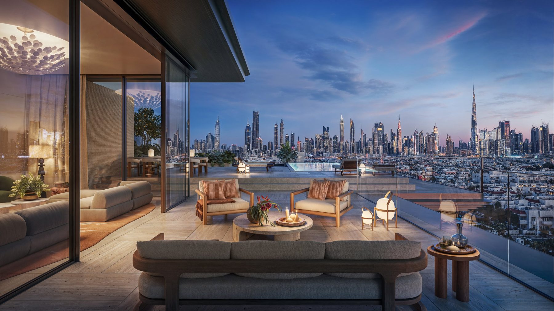Penthouse terrace at dusk with a private pool and views of the Dubai skyline