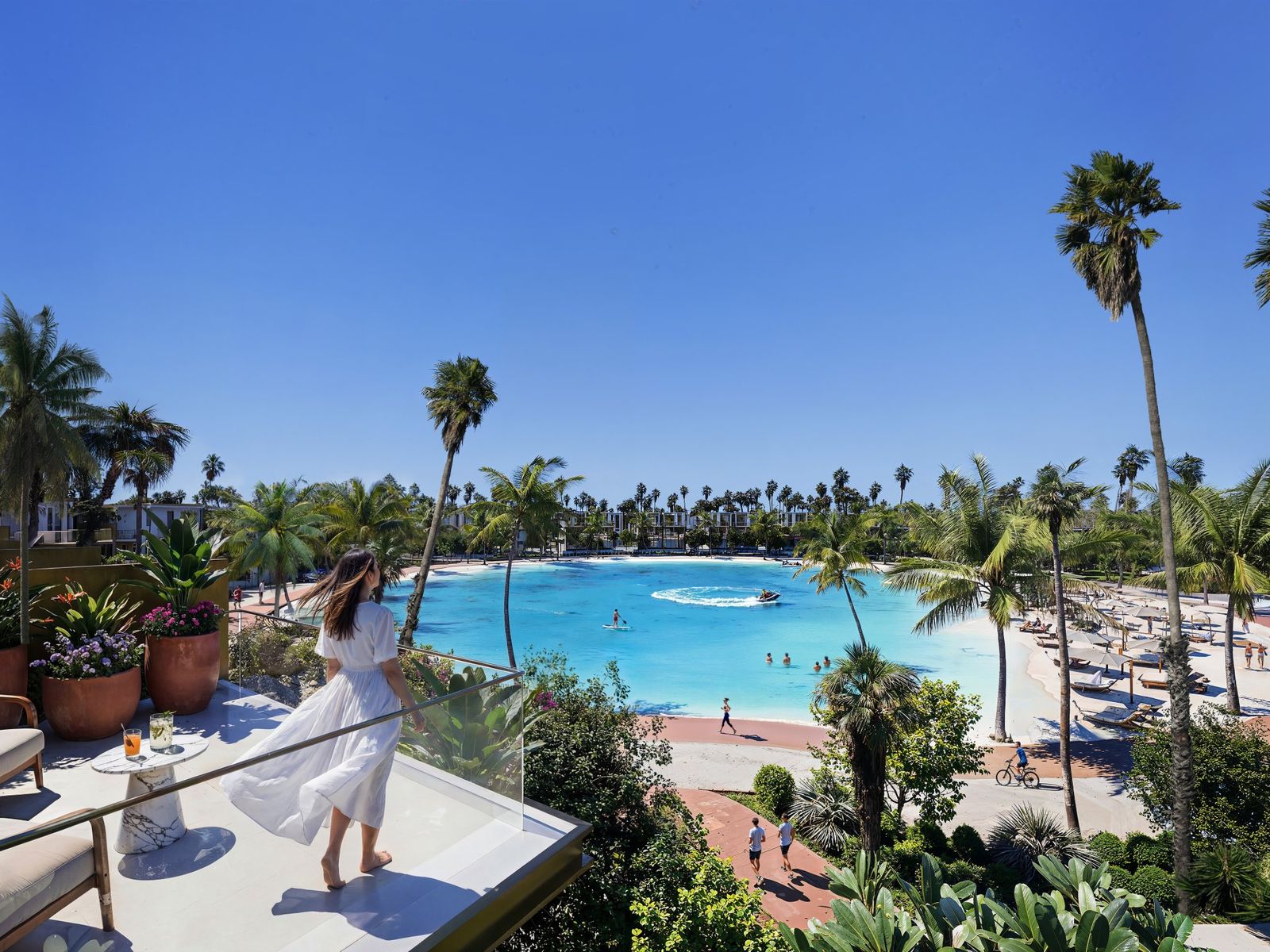 Balcony view over the artificial beach and lagoon at Tilal Binghatti